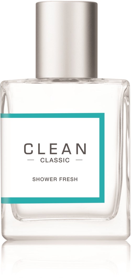 En klar flaska med silverlock, märkt 'Clean Classic Shower Fresh', som visar att det är duschgel eller doft.