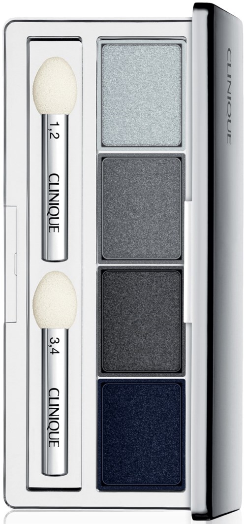 A Clinique eyeshadow palette with four colors and two applicators.