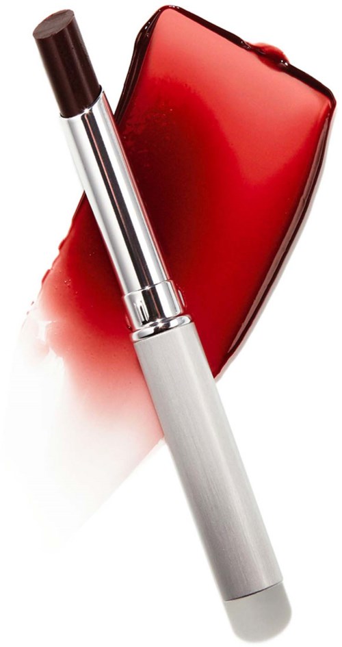 A red lipstick case with lipstick and a lipstick tube in front of it.