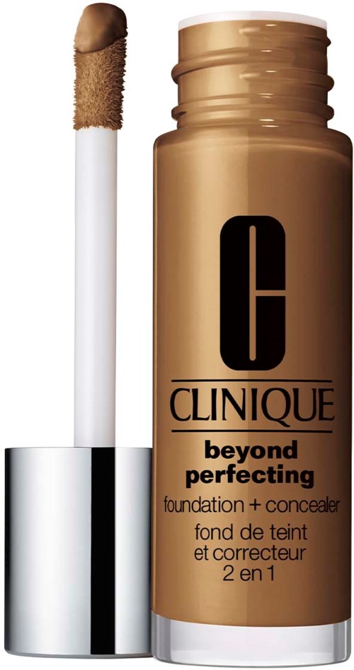 A bottle of Clinique 'Beyond Perfecting' foundation and concealer with a wand applicator. Gold-colored container.