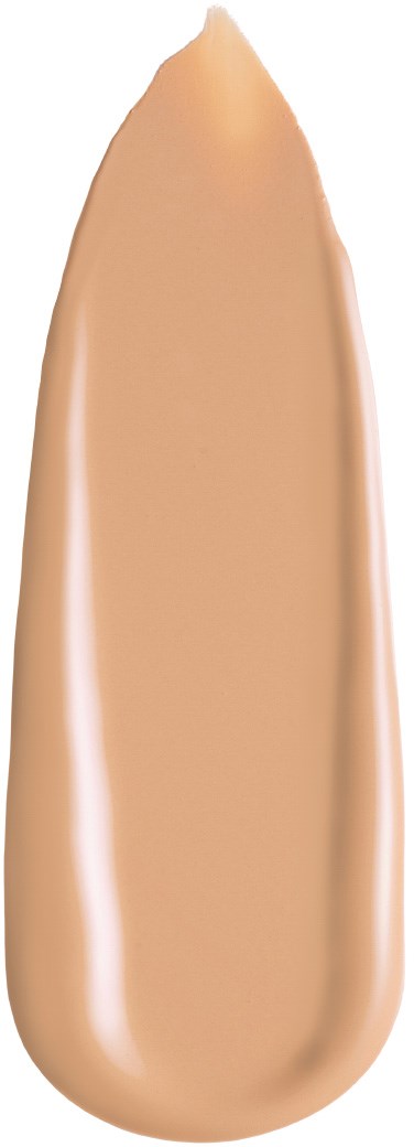 En dråpe av beige flytende foundation med glatt, blank overflate på svart bakgrunn.