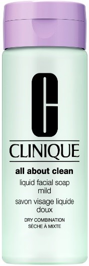 En flaske Clinique All About Clean flytende ansiktsåpe med lilla lokk.