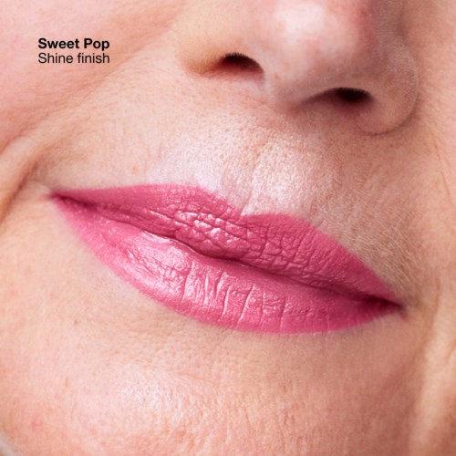 Close-up of lips with pink lipstick, showing shine and smooth texture. Text says "Sweet Pop Shine finish."