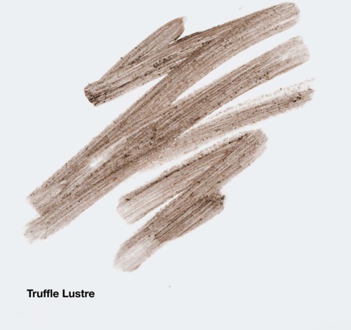 Prøver af beige og brune øjenskygger kaldet Truffle Lustre med en glat, skinnende finish.