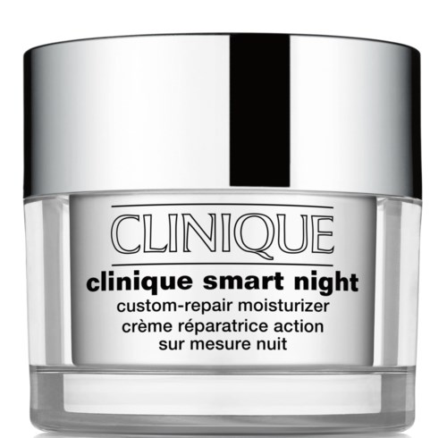 A clear jar of Clinique Smart Night moisturizer with a silver cap and black stripe, labeled in black text.