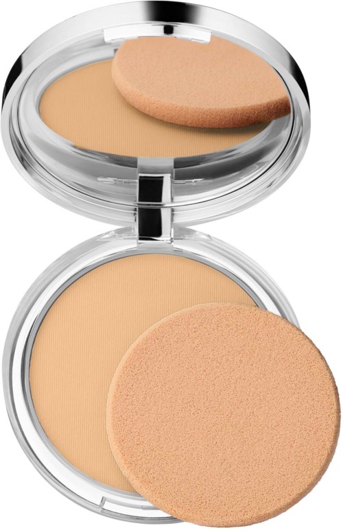 En lille pudderboks med beige foundation og en lyserød svamp i en gennemsigtig beholder.