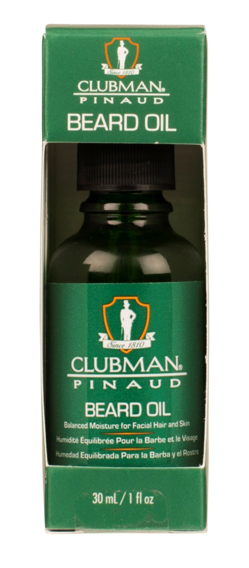 Grønn eske med en svart flaske inni, merket 'Clubman Pinaud Beard Oil' for ansiktshår. Inneholder 30ml eller 1 fl oz.