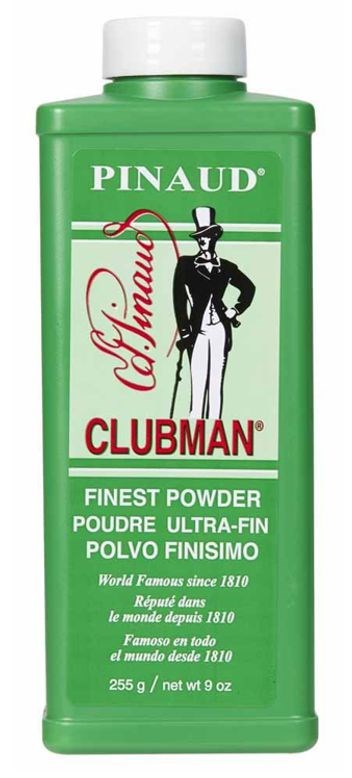 En grön behållare med Clubman-pulver, vit kork, med en man i hatt och kostym-logo.