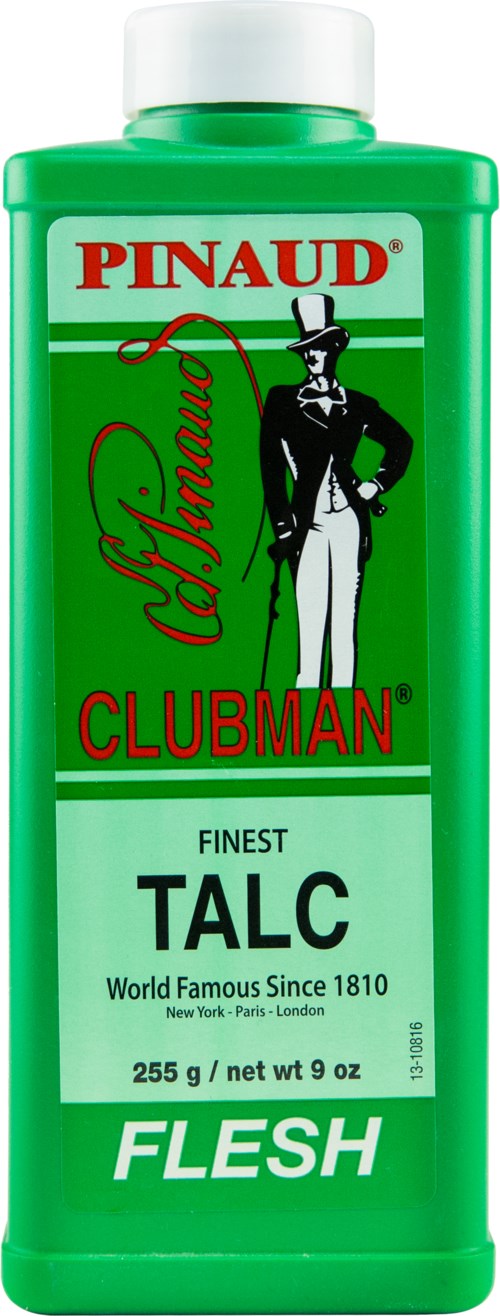 En grønn beholder av Pinaud Clubman Talc med hvit lokk, etiketten viser en mann i smoking, merkevaredetaljer og ordet "Flesh."