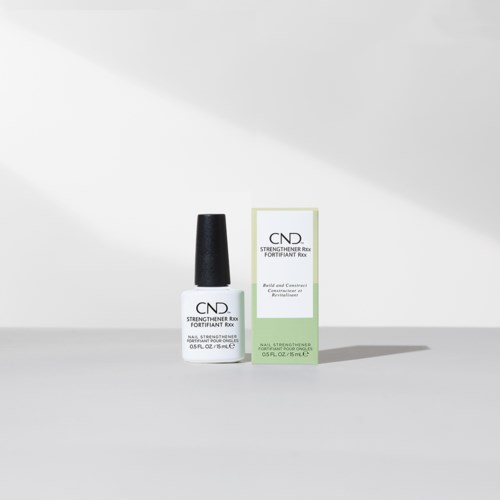 A nail strengthener product with white bottle, black cap, and green and white box background.