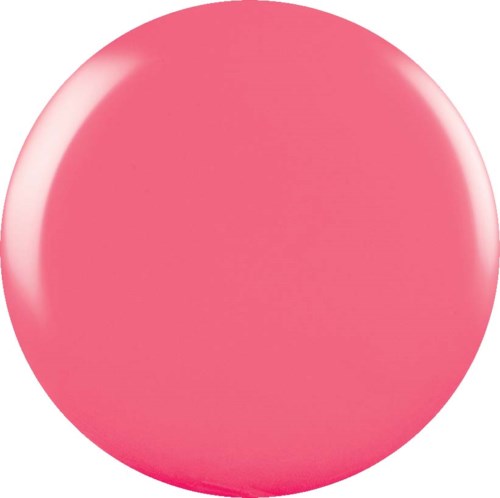 En stor rosa boll med glansig yta, slät och rund, upptar större delen av bilden.