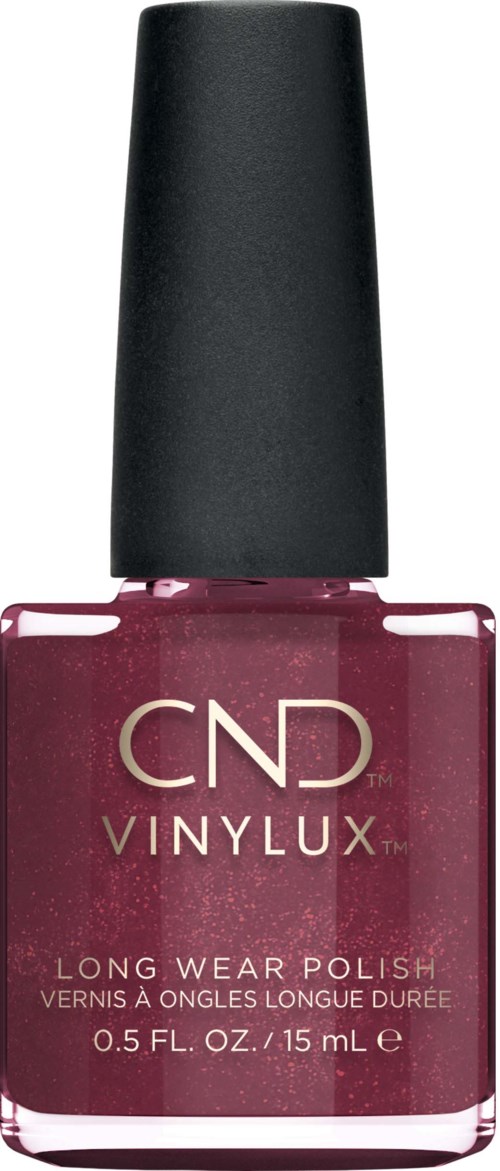 En rosa nagellackflaska från CND Vinylux med svart kork, märkt för långvarig användning och 15 mL storlek.