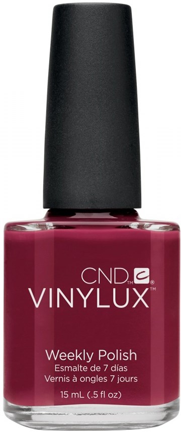 En flaska med mörk rosa nagellack med svart lock, märkt CND VINYLUX Weekly Polish, 15 mL.