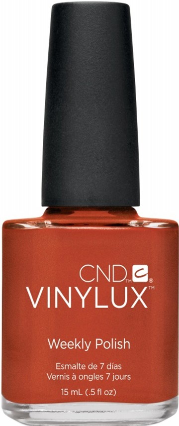 En flaska nagellack med svart lock, märkt 'CND VINYLUX Weekly Polish' i röd färg.