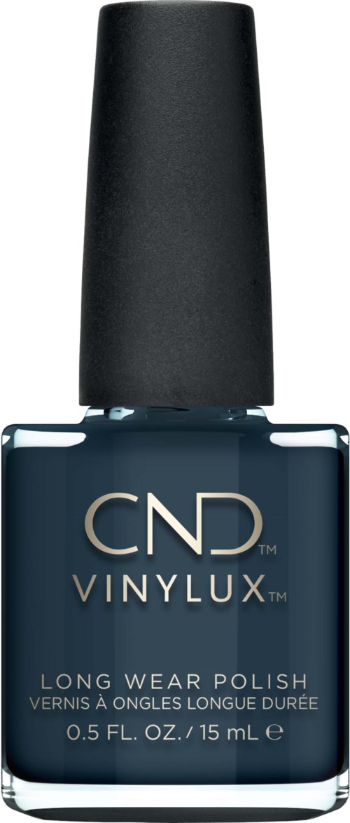 En flaska med mörkblått nagellack för långt håll, med svart lock, märkt CND VINYLUX.