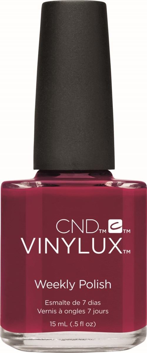 En flaska med mörkröd nagellack med svart topp. Den står "CND Vinylux Weekly Polish."