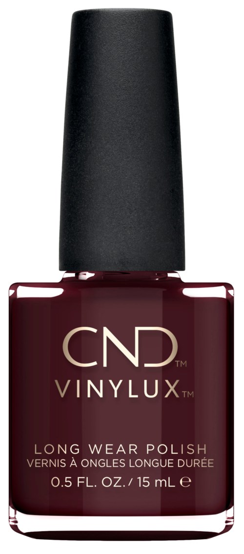En flaska med CND VINYLUX nagellack i mörkröd med svart lock.