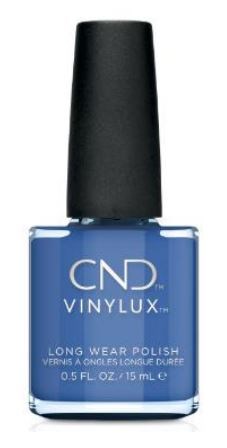 En blå nagellackflaska med svart lock, märkt CND VINYLUX, säger att det är ett långvarigt nagellack.