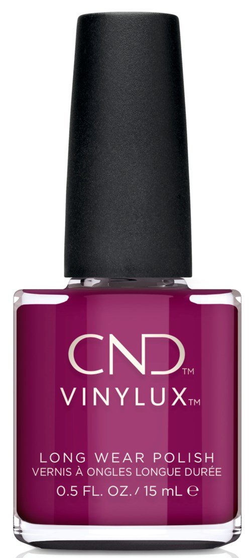 En flaska med lila nagellack med svart lock, märkt 'CND VINYLUX Long Wear Polish'.