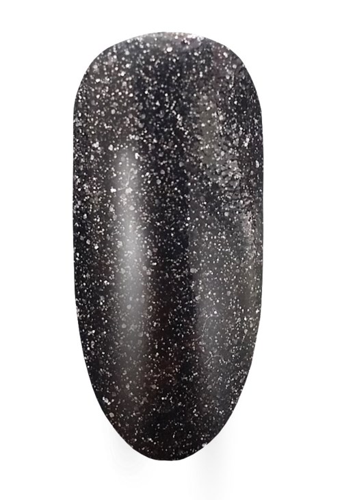 En svart nagellack med vita glittrar som liknar stjärnor eller galaxmönster.