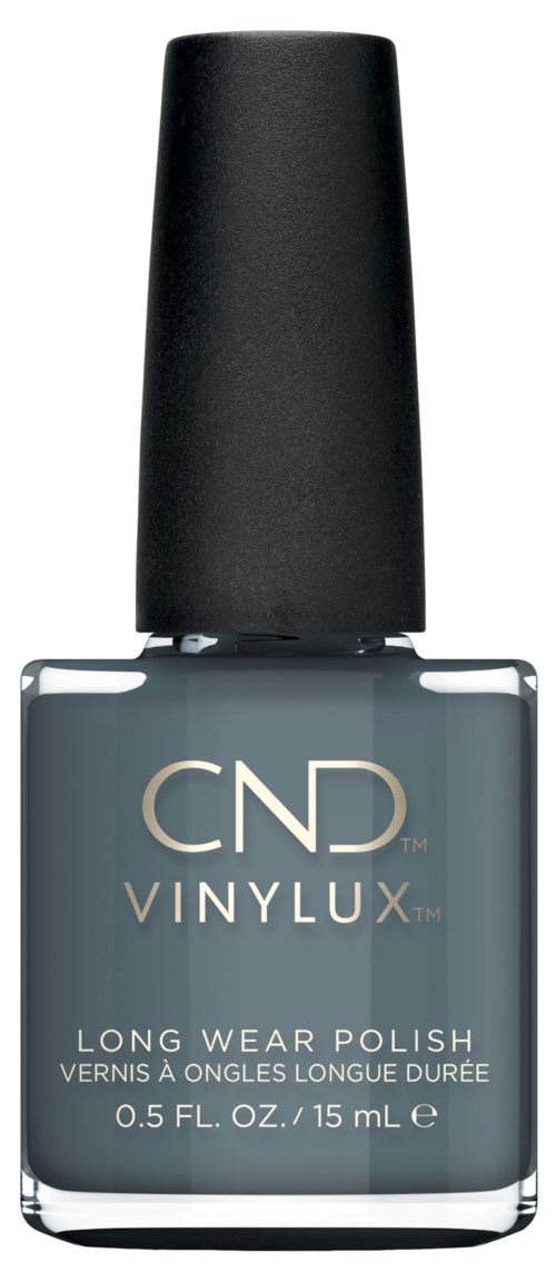 En flaska grå nagellack med svart lock, märkt 'CND Vinylux Long Wear Polish' och storleksuppgifter.