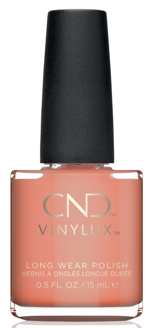 En flaska med CND Vinylux nagellack i en mjuk rosa färg med svart lock.