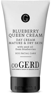 En hvit tube merket Blueberry Queen Cream, med svart lokk, for moden og tørr hud, ingredienser inkluderer blåbær og frøolje.