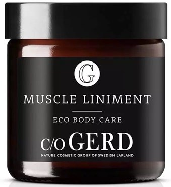 Svart krukke med hvit og sølv tekst, merket 'Muscle Liniment Eco Body Care' og 'c/o GERD', som fremhever en naturlig kosmetikkgruppe.