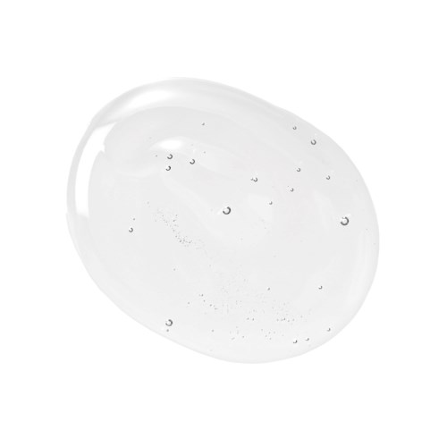 En klar gel eller vätska med små bubblor inuti, formad som en oval.