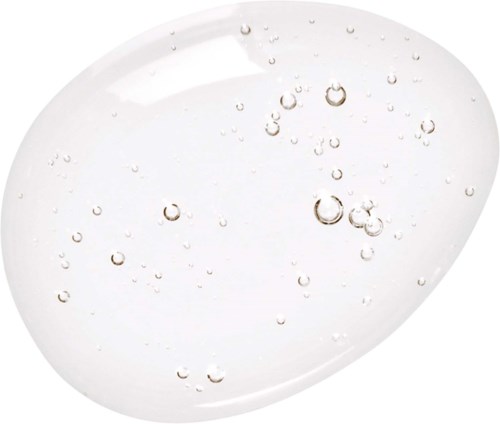 Ein klarer Gel mit kleinen Bläschen darin, geformt wie ein undurchsichtiges Seifen- oder Hautpflegeprodukt.