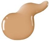En klick beige vätska med en böjd form på en enkel bakgrund.