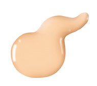 Ett beige, ojämnt, rundat föremål med spetsig ände och glänsande yta.