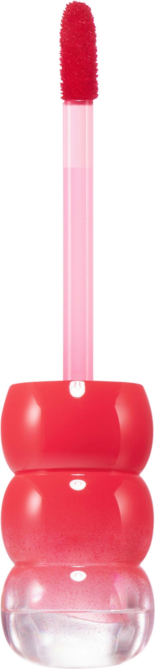 Lippenbalsem met een rode applicator in een doorzichtige en roze versierde houder.