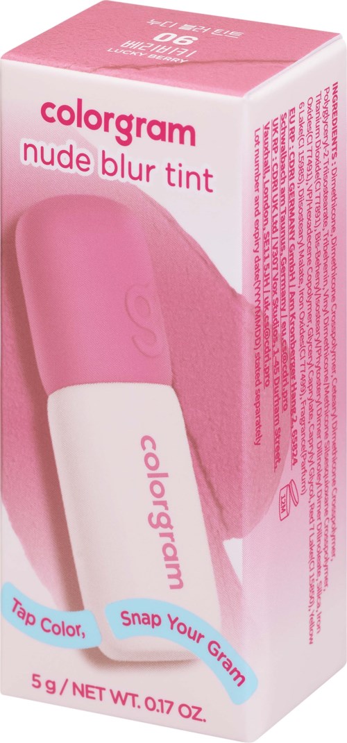 Roze en witte doos voor kleurcrème met zachte blending-effect, gelabeld als nude blur tint en bevat productbeschrijving.
