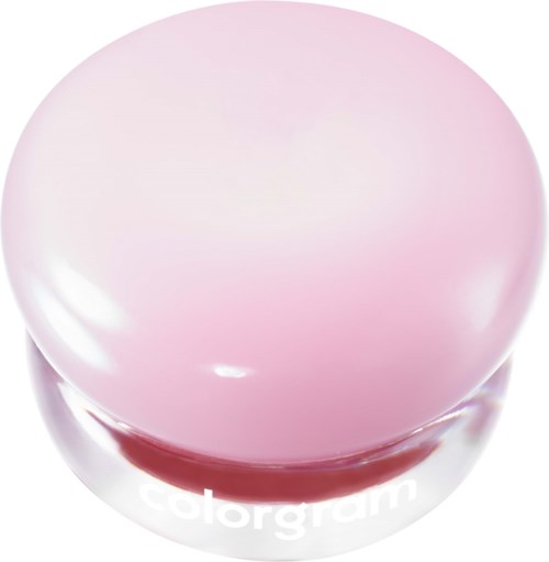 Een ronde, roze en witte crèmecontainer met het woord colorgam.