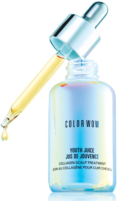 A bottle of skincare serum with a dropper, labeled 'Color Wow Youth Juice' with light reflections on the bottle.