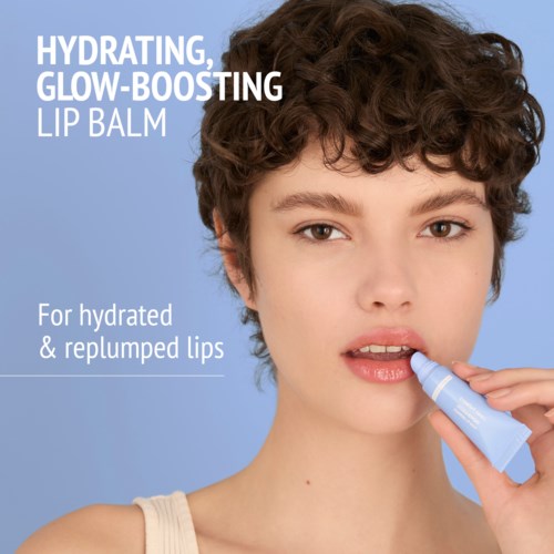 A woman applying lip balm, promoting hydration and glossy lips, against a blue background.