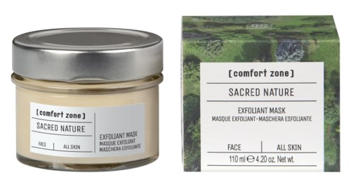 En liten krukke med ansiktspeelingmaske med grønn emballasje som viser naturbilder.