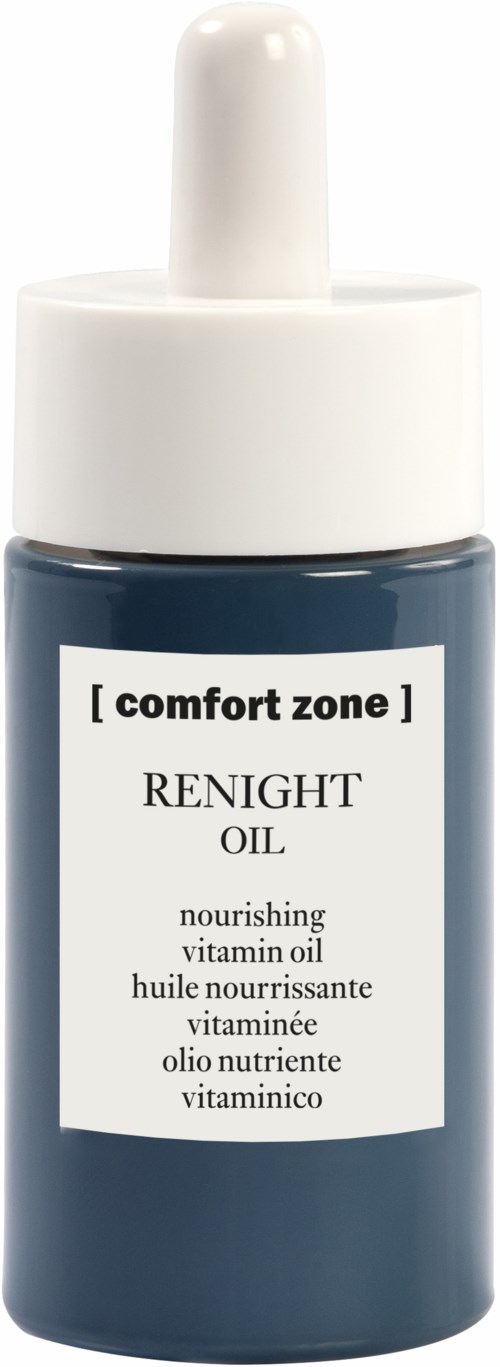 En mörkblå flaska med en vit droppkork märkta 'comfort zone' och 'renight oil' för närande hud.