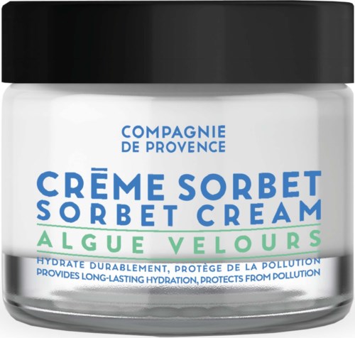 En burk sorbetsorbet med svart lock, blå, grön och vit etikett som nämner återfuktning och skydd mot föroreningar.