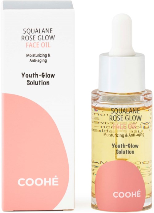 Ein Hautpflegeprodukt namens Squalane Rose Glow Face Oil in kleiner Flasche mit Pipette, neben der Box.