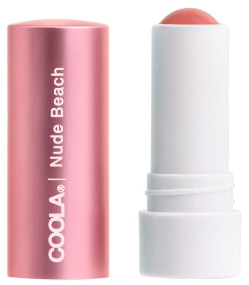 Ein rosa Behälter mit "Coola Nude Beach" geschrieben und ein weißer Stick mit abgerundeter Spitze, wahrscheinlich Kosmetikprodukt.