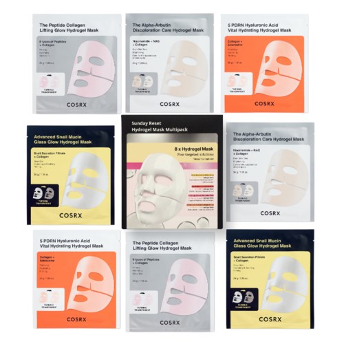 Verschillende gezichtsmaskerverpakkingen met verschillende ingrediënten en kleuren, voornamelijk wit en oranje, op een display.