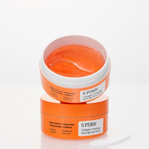 To orange bøtter med øjenpuder mærket 5 PDRN, den ene åben viser orange gel.