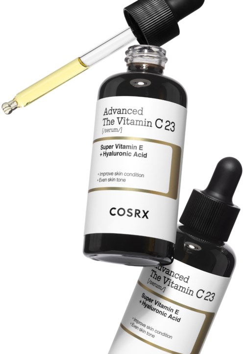 En flaska hudserum med en pipett och en mindre flaska, båda märkta med C-vitamin och hyaluronsyra.