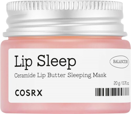 Mały różowy słoik oznaczony Lip Sleep, zawiera ceramidową masełko do ust na sen, z srebrną zakrętką.