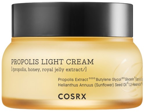 En krukke med Propolis Light Cream fra COSRX med svart lokk og gulaktig kropp, inneholder naturlige ingredienser.