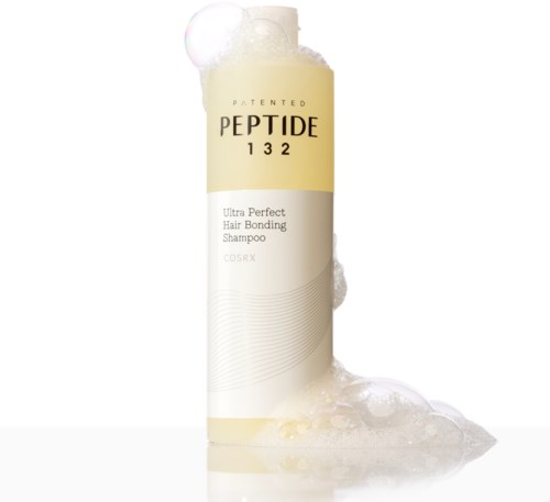 En lång vit flaska med gul topp märkt 'PEPTIDE 132', tvålliknande bubblor runt den, och en vit bakgrund.