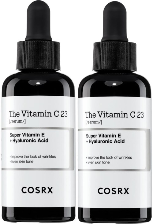 Två svarta flaskor med droppar märkta "The Vitamin C 23" som innehåller serum med vitamin E och Hyaluronsyra.