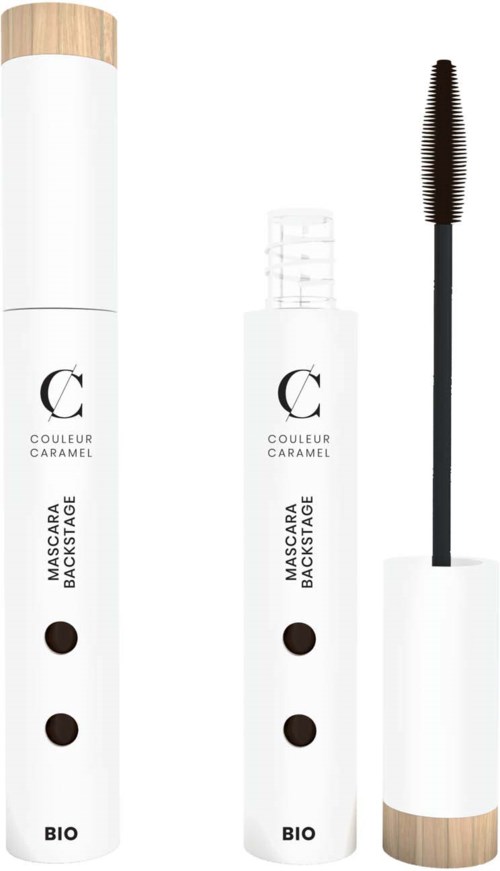 Två vita makeuptuber med svarta prickar och ett brunt lock, en med en öppen borste, märkt 'Mascara Backstage'.